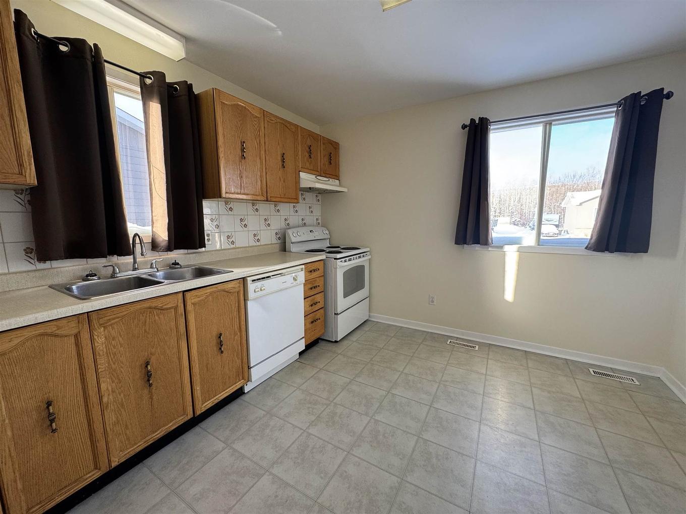 77 Matachewan Road, Manitouwadge, ON - Indoor Photo Showing Kitchen With Double Sink