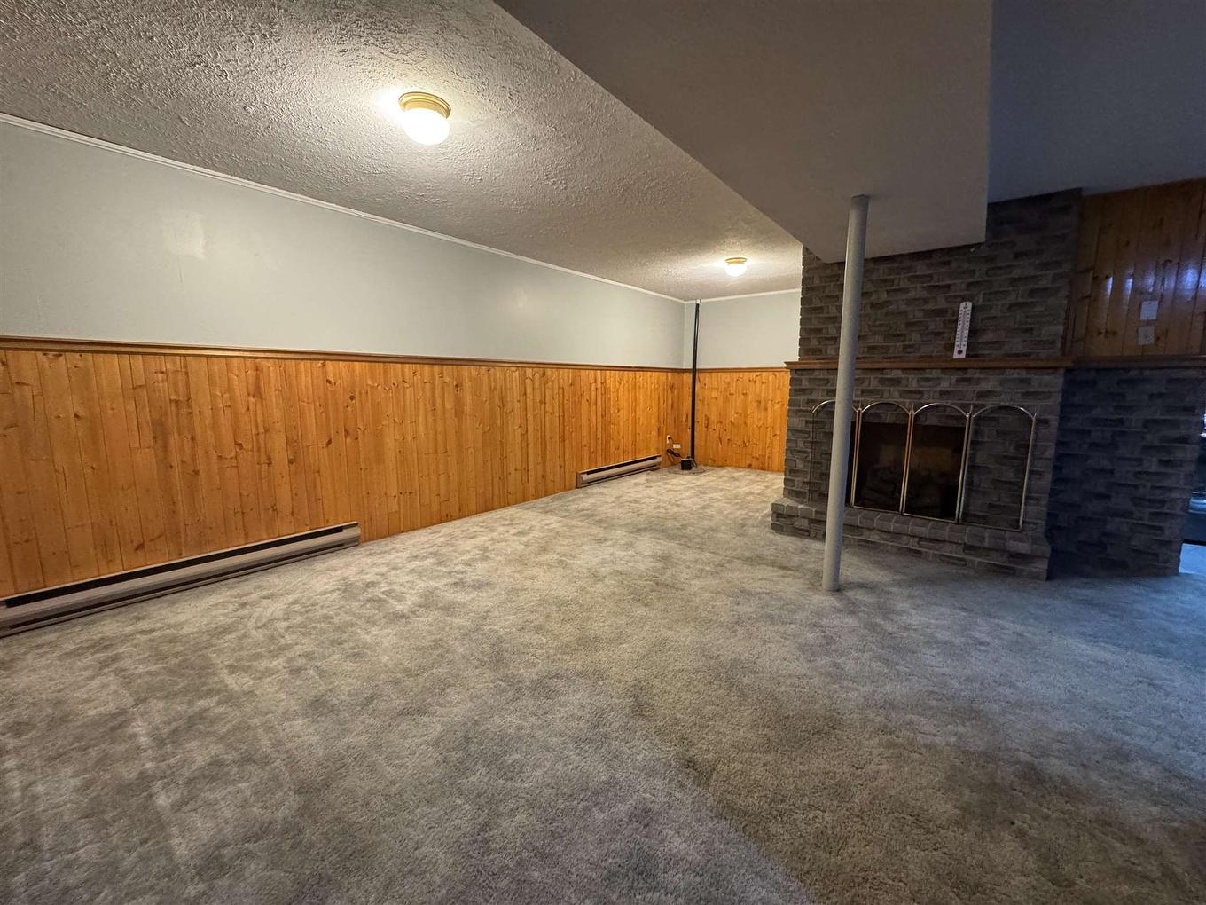 77 Matachewan Road, Manitouwadge, ON - Indoor Photo Showing Other Room With Fireplace