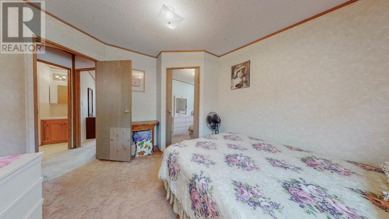 129 Walnut Place, Oliver, BC - Indoor Photo Showing Bedroom