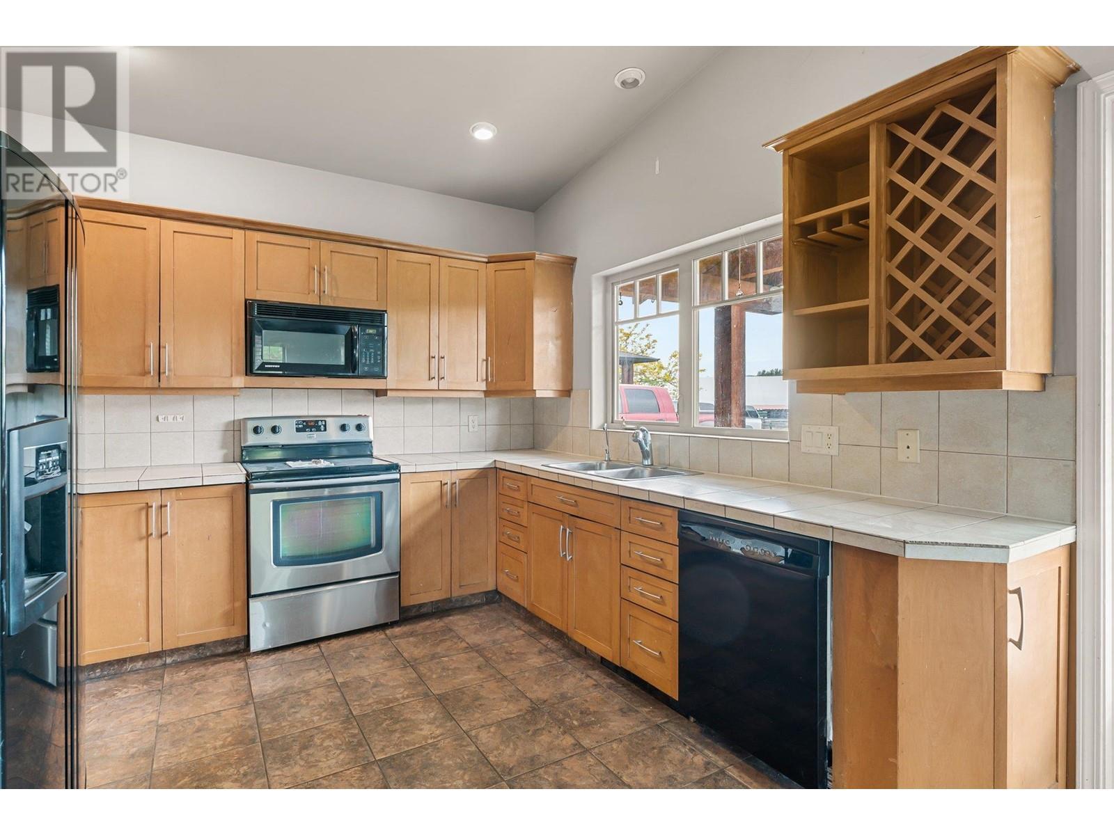 3830 Casorso Road, Kelowna, BC - Indoor Photo Showing Kitchen With Double Sink