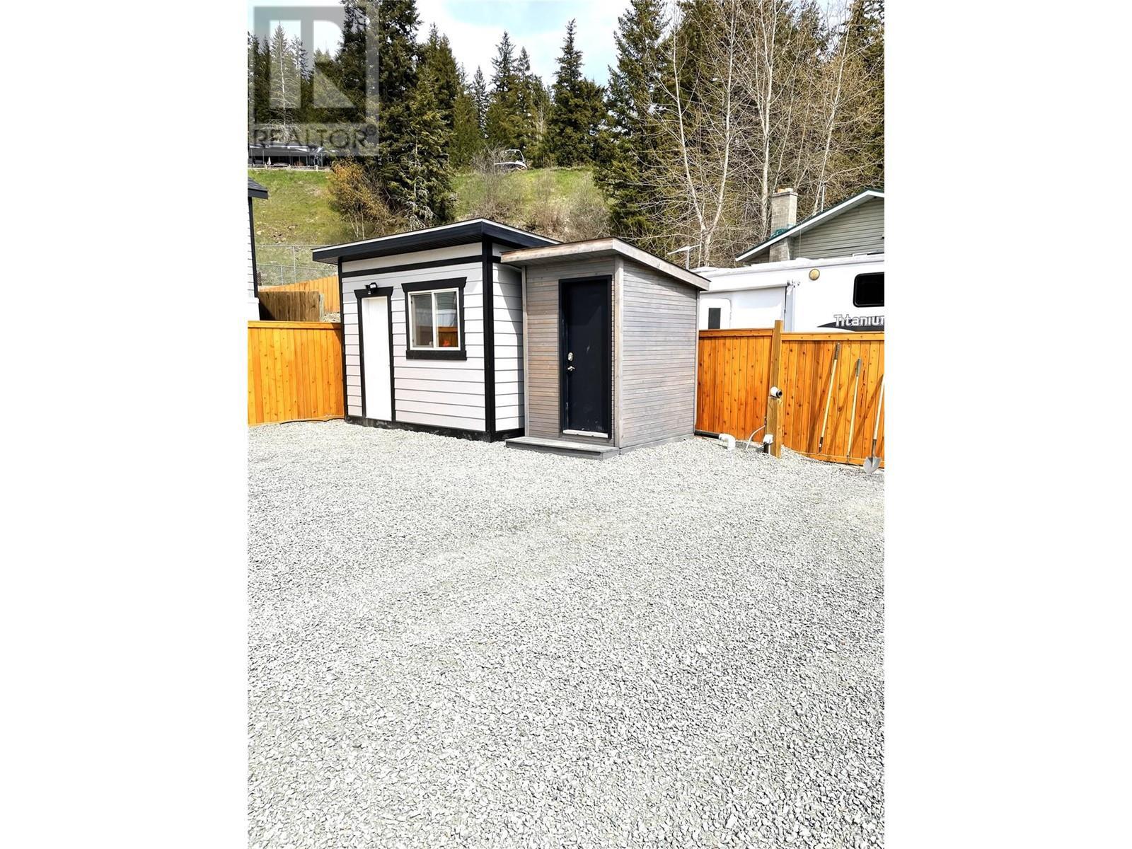 10'x12' Bunkhouse (insulated) & bathroom c/w vanity hooked up to septic. - 2633 Squilax-Anglemont Road Lot# #66, Lee Creek, BC