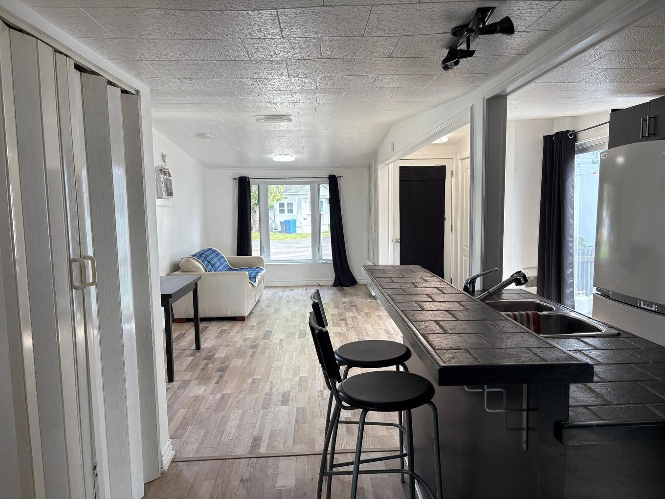 Cuisine - 128-3950 Boul. Sir-Wilfrid-Laurier, Longueuil (Saint-Hubert), QC - Indoor Photo Showing Kitchen With Double Sink