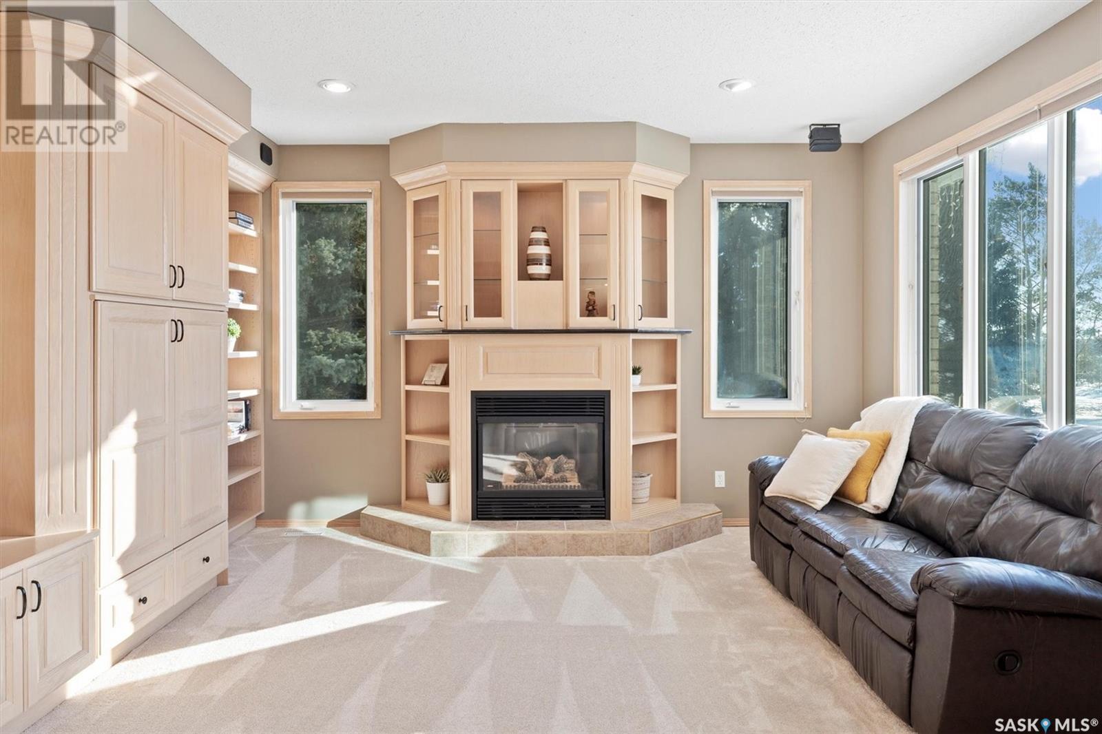 9 Cherry Lane, Corman Park Rm No. 344, SK - Indoor Photo Showing Living Room With Fireplace