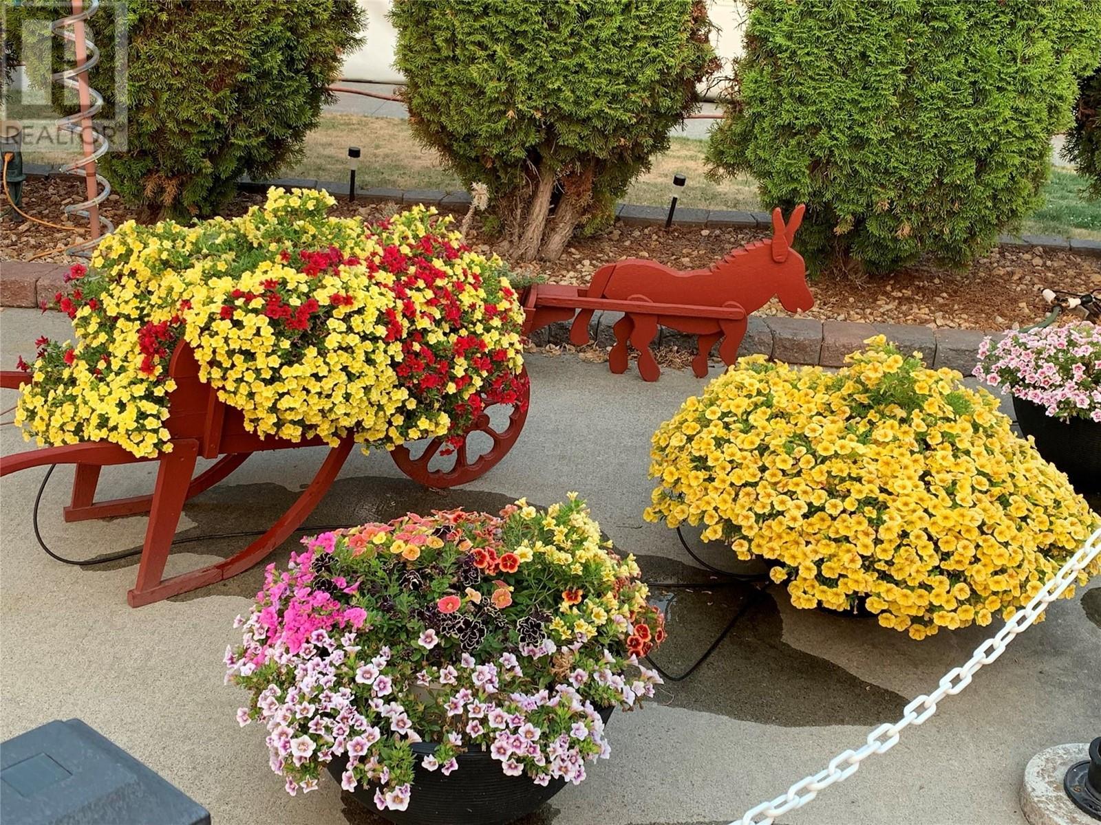 Summer gardens flourish here! - 8000 Highland Road Unit# 42, Vernon, BC - Outdoor