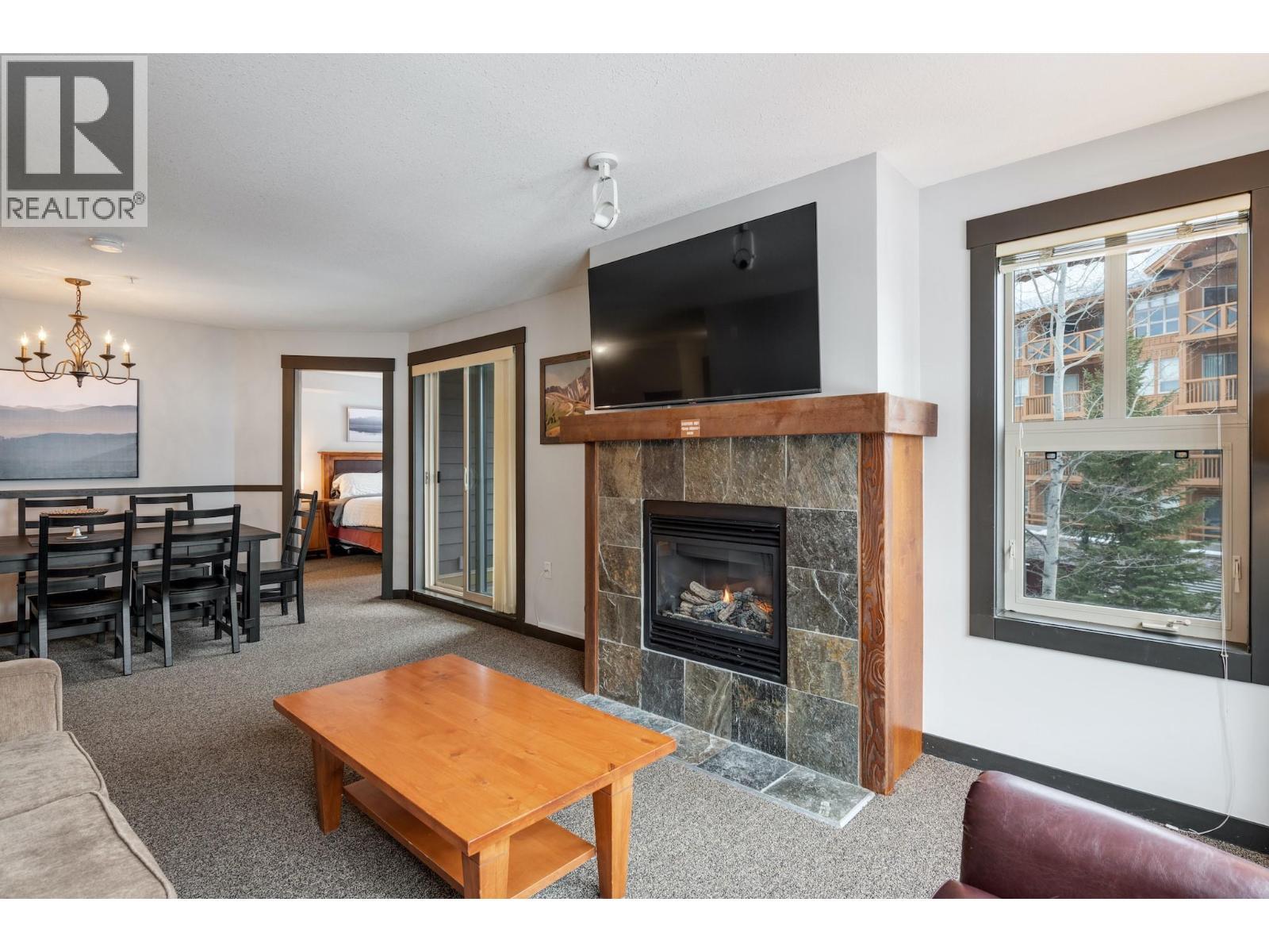 2070 Summit Drive Unit# 301A, Panorama, BC - Indoor Photo Showing Living Room With Fireplace
