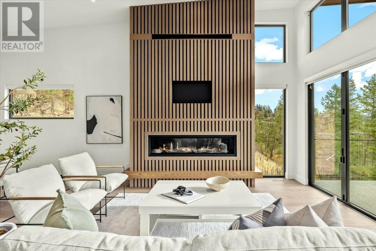 124 Wildsong Crescent W, Vernon, BC - Indoor Photo Showing Living Room With Fireplace