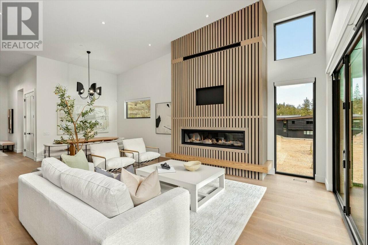 124 Wildsong Crescent W, Vernon, BC - Indoor Photo Showing Living Room With Fireplace