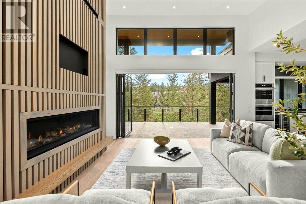 124 Wildsong Crescent W, Vernon, BC - Indoor Photo Showing Living Room With Fireplace