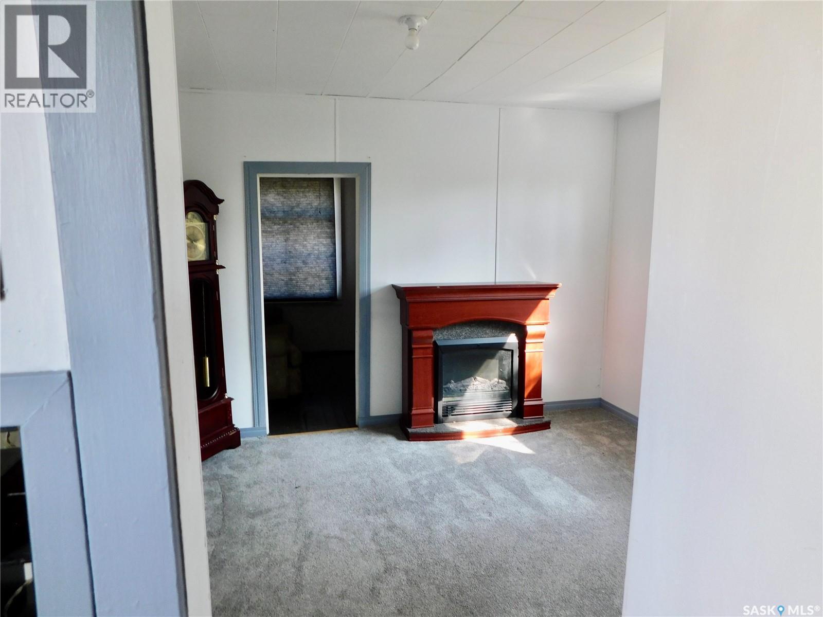 214 2Nd Street E, Lafleche, SK - Indoor With Fireplace