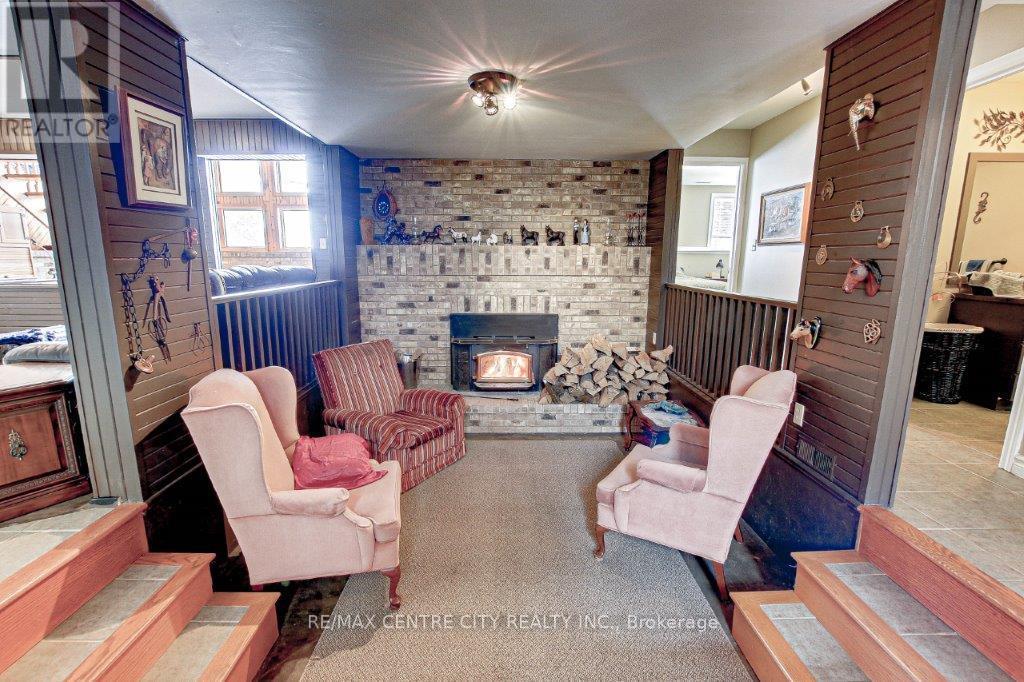 34639 Third Line, Southwold, ON - Indoor With Fireplace