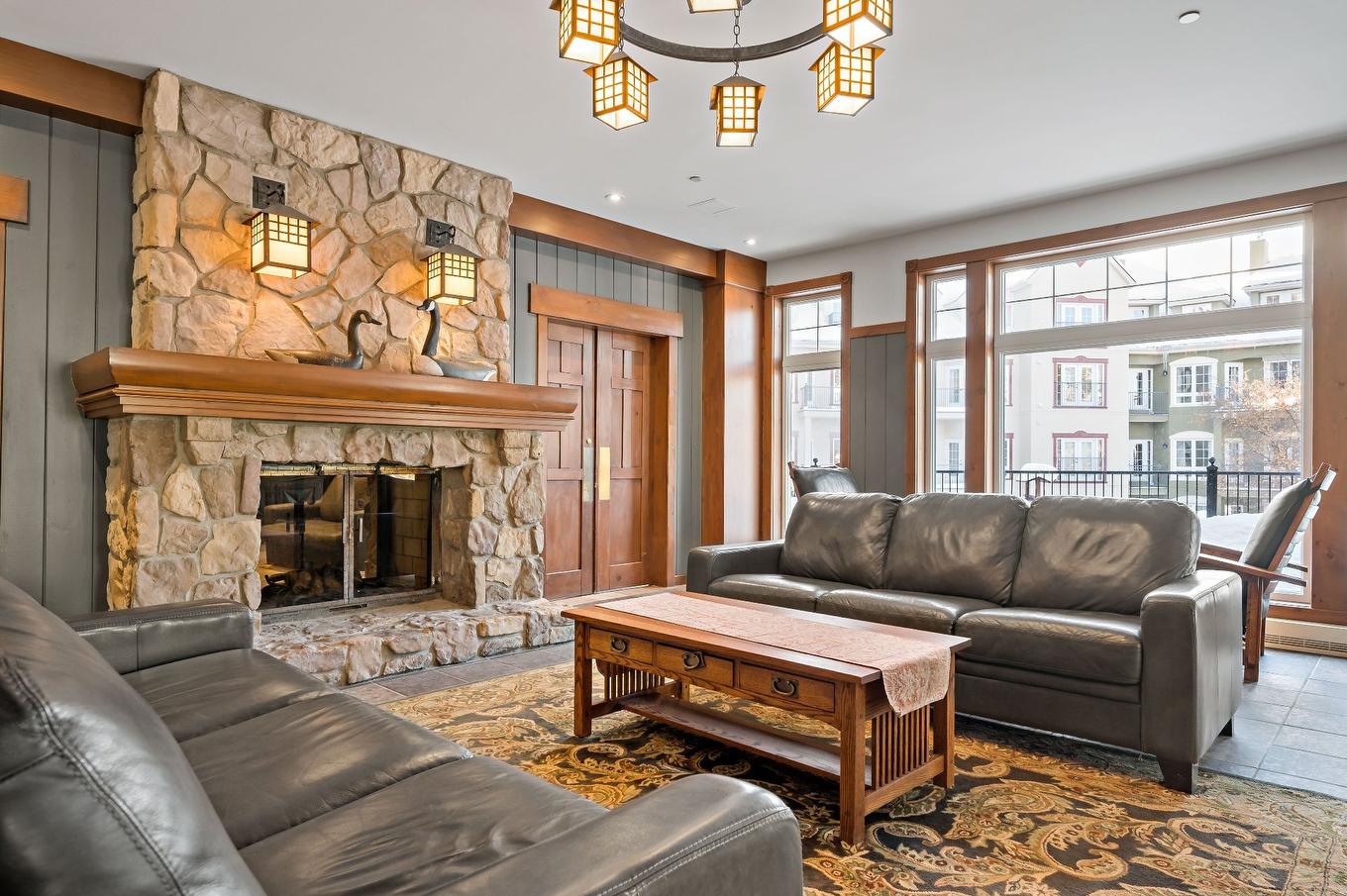 Autre - 388-161 Ch. Du Curé-Deslauriers, Mont-Tremblant, QC - Indoor Photo Showing Living Room With Fireplace