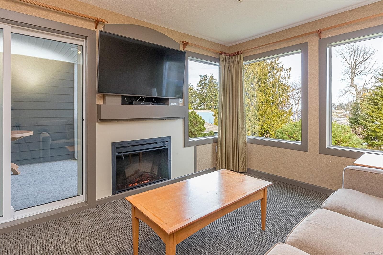 721-1600 Stroulger Rd, Nanoose Bay, BC - Indoor Photo Showing Living Room With Fireplace
