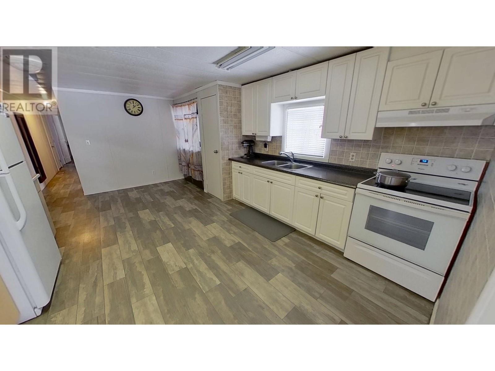 13431 N 29 Highway, Fort St. John, BC - Indoor Photo Showing Kitchen With Double Sink