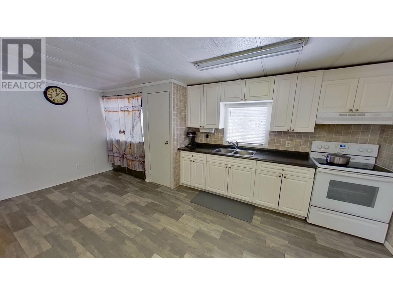13431 N 29 Highway, Fort St. John, BC - Indoor Photo Showing Kitchen With Double Sink