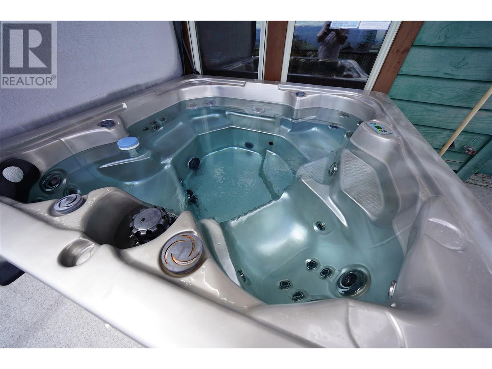 Big White Condo Strata Apartment for Sale - 255 Raven Ridge Road Unit# 3, Big White, BC - Indoor Photo Showing Garage