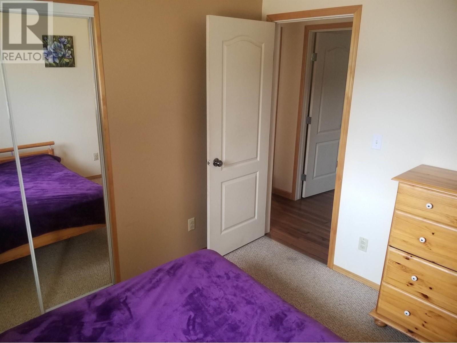 806 4Th Avenue, Mcbride, BC - Indoor Photo Showing Bedroom