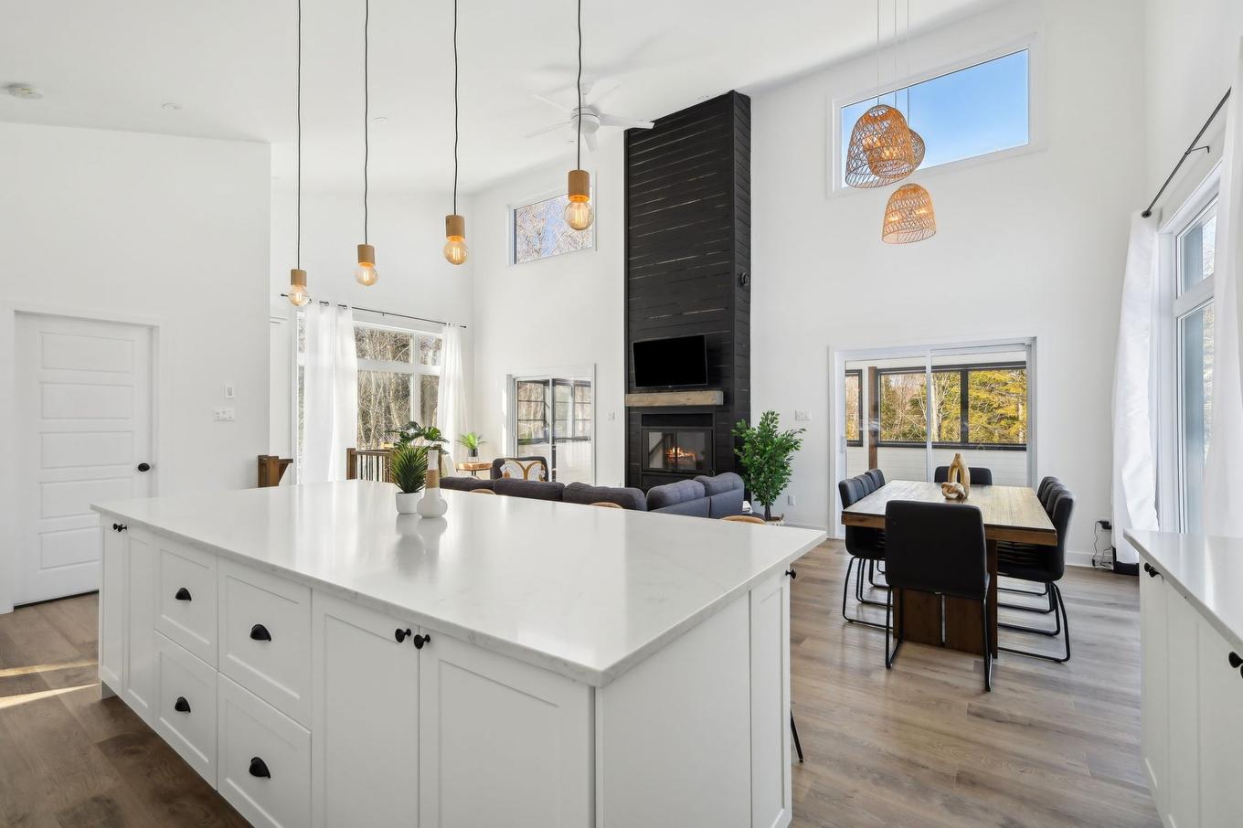 Kitchen - 25 Ch. Des Cerisiers, Lac-Supérieur, QC - Indoor With Fireplace