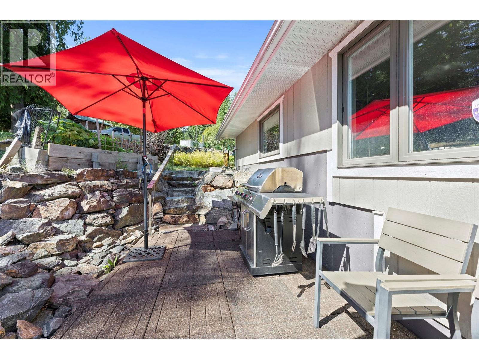 BBQ area from Laundry - 8738 Squilax Anglemont Road, St. Ives, BC - Outdoor With Deck Patio Veranda