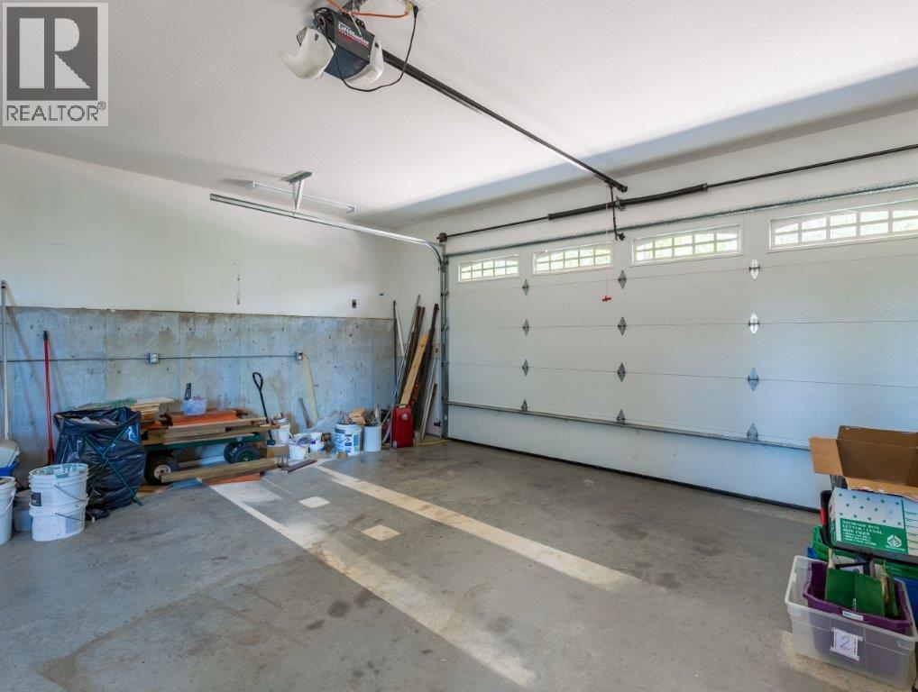 garage - 8738 Squilax Anglemont Road, St. Ives, BC - Indoor Photo Showing Garage