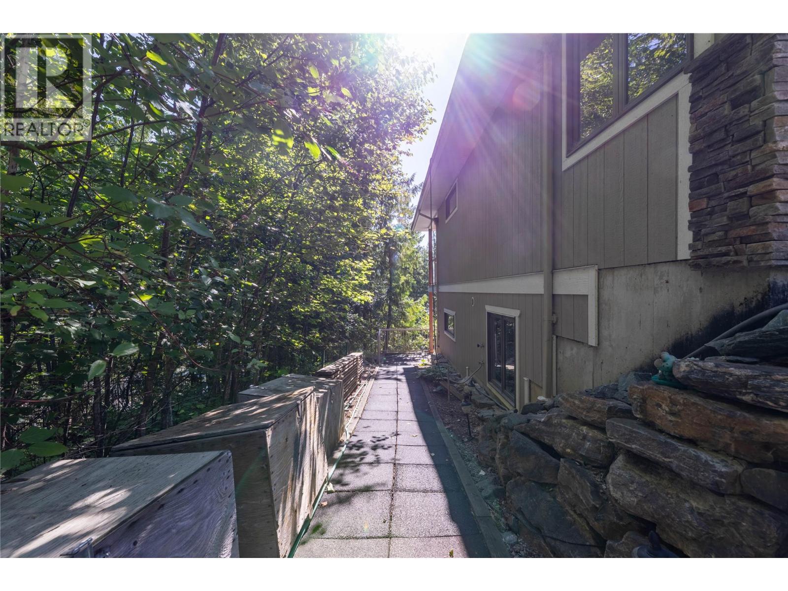 Path on East side of house to bsmt suite - 8738 Squilax Anglemont Road, St. Ives, BC - Outdoor