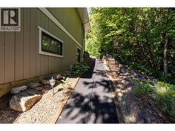 Path on East side of house from bsmt suite to driveway -