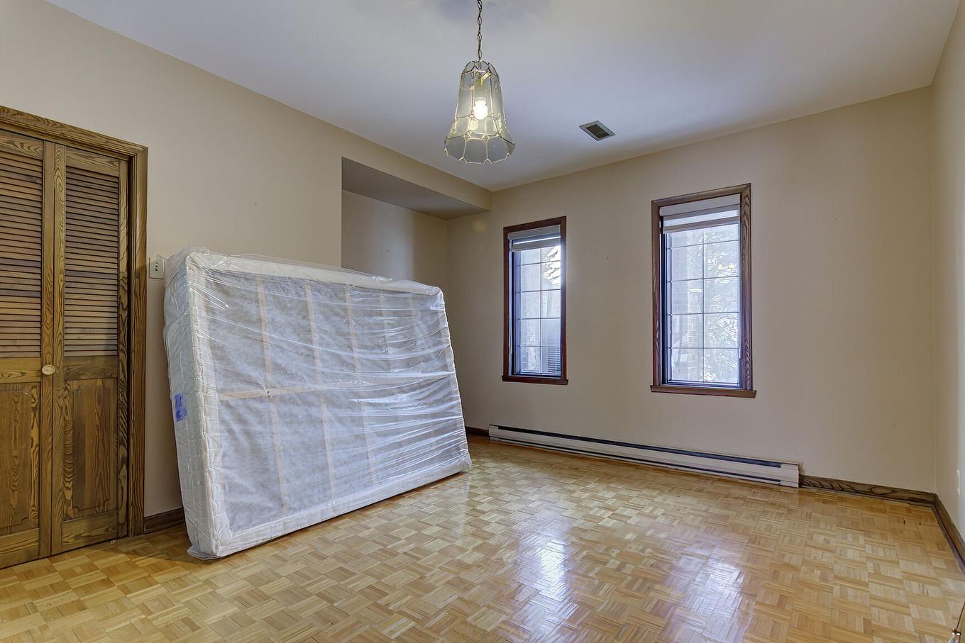 Chambre à coucher - 12040 Rue Jasmin, Montréal (Ahuntsic-Cartierville), QC - Indoor Photo Showing Other Room