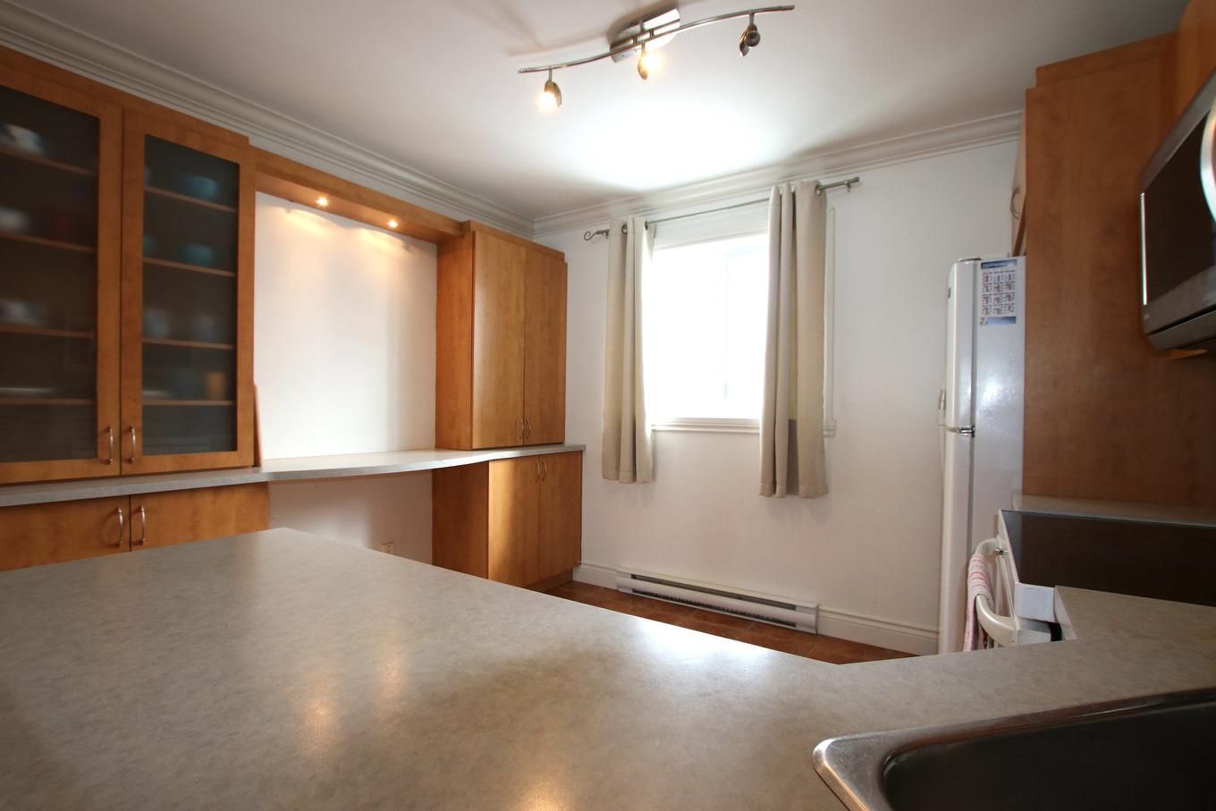 Kitchen - 3-9000 Rue Des Roselieres, Brossard, QC - Indoor Photo Showing Other Room