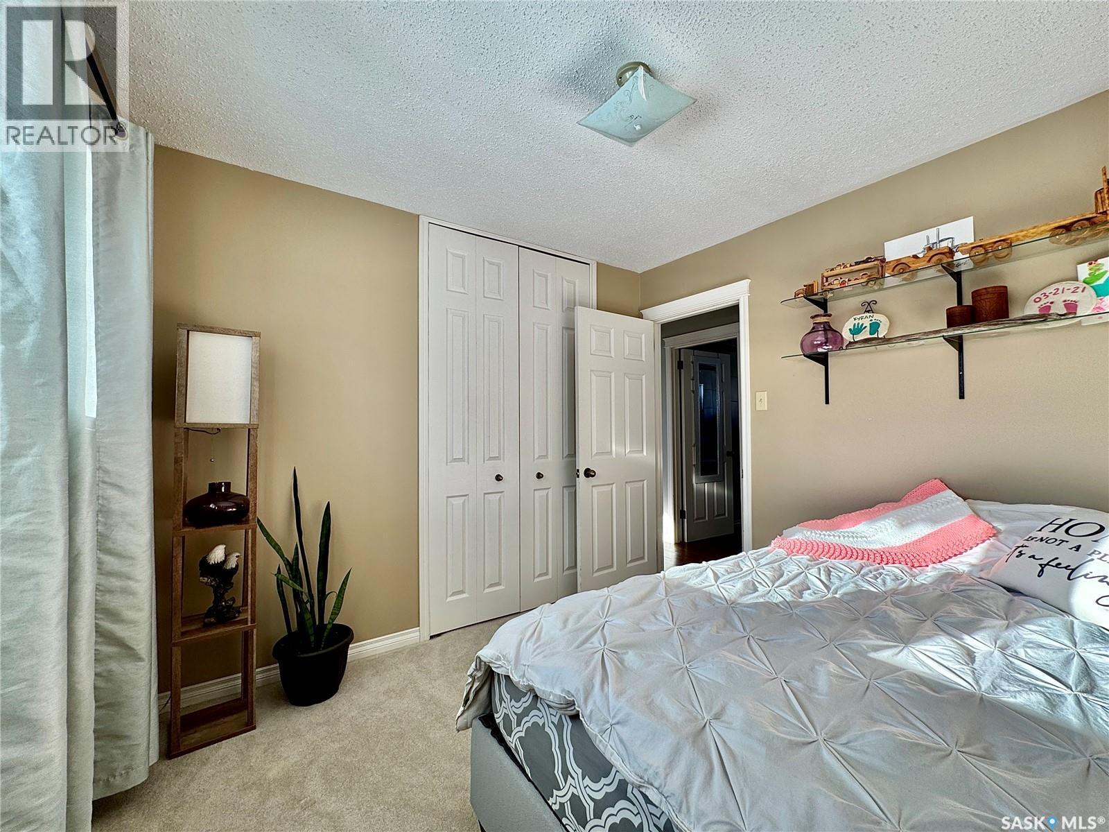304 March Avenue E, Langenburg, SK - Indoor Photo Showing Bedroom