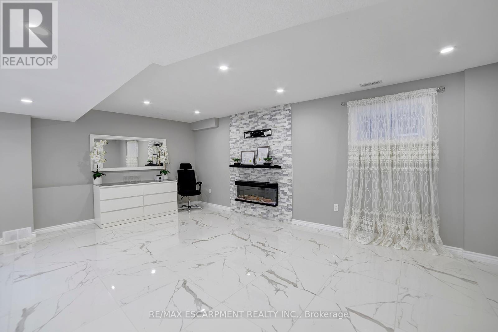 111 Vineberg Drive, Hamilton, ON - Indoor With Fireplace