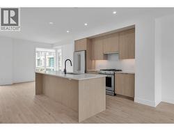 Spacious Kitchen -Photos are of a similar home in the community, in the same colour scheme, some features may vary. -