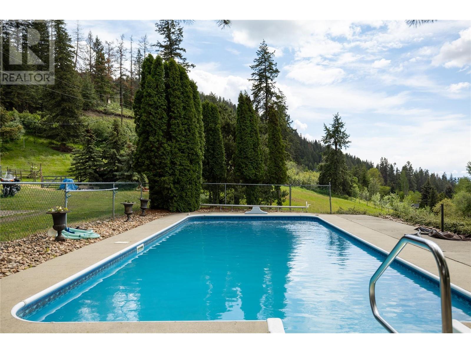5620 Neil Road, Vernon, BC - Outdoor With In Ground Pool With Backyard
