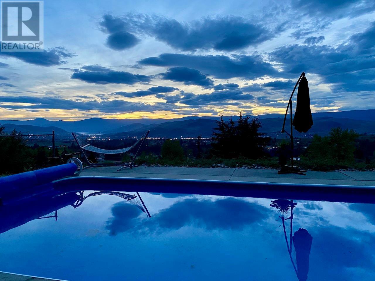 5620 Neil Road, Vernon, BC - Outdoor With In Ground Pool With View