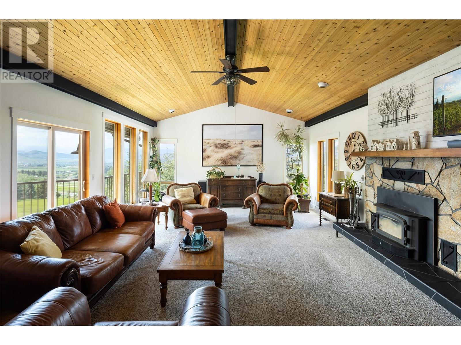 5620 Neil Road, Vernon, BC - Indoor Photo Showing Living Room With Fireplace