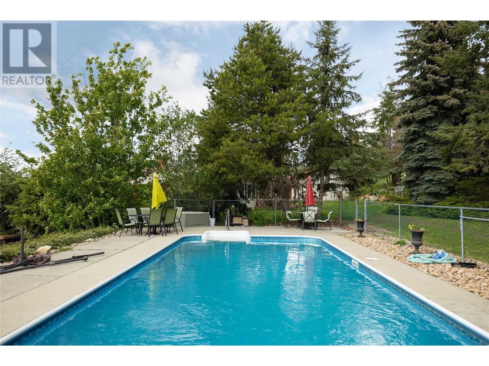 5620 Neil Road, Vernon, BC - Outdoor With In Ground Pool With Backyard