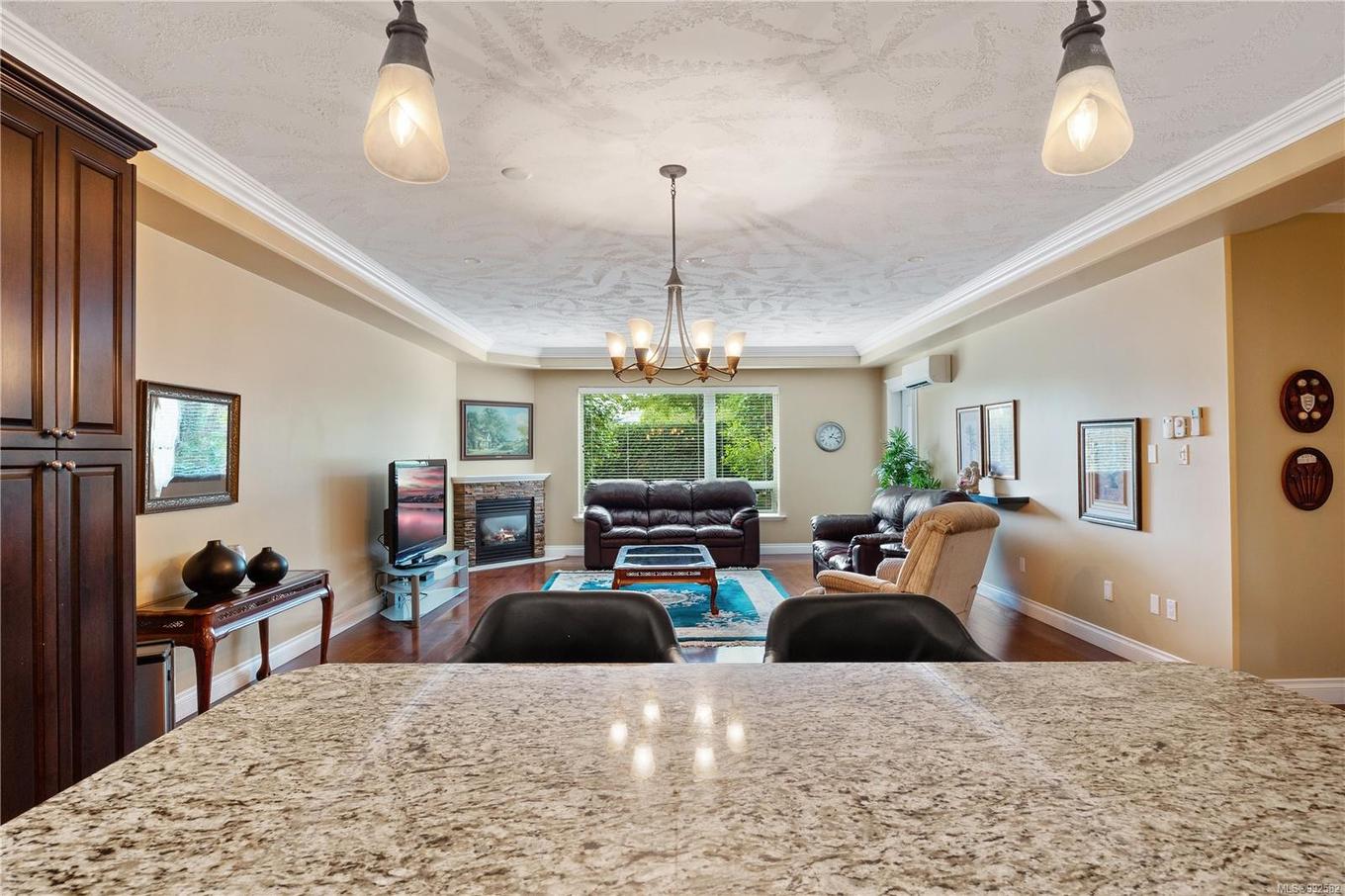 415-3666 Royal Vista Way, Courtenay, BC - Indoor With Fireplace