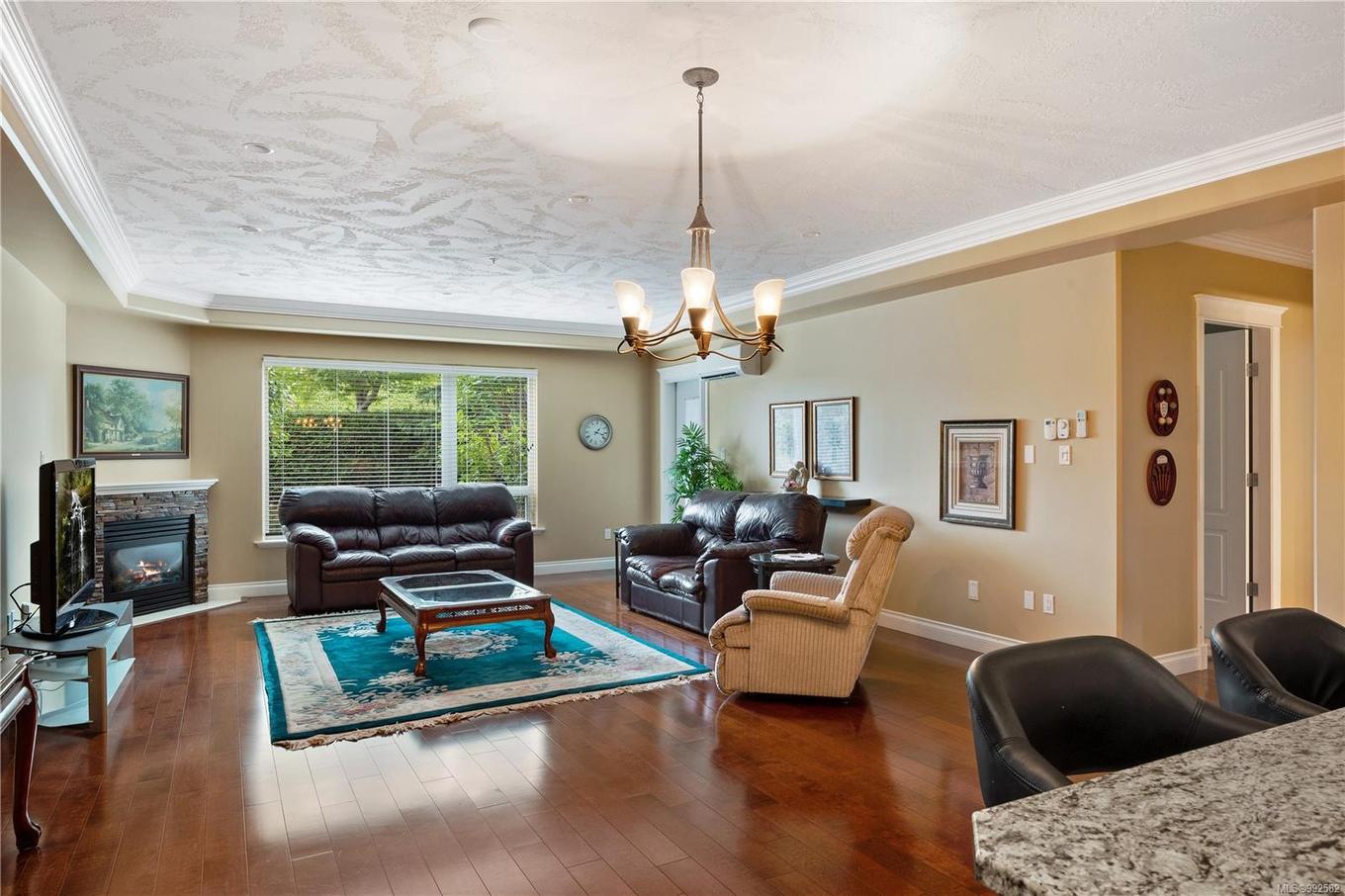 415-3666 Royal Vista Way, Courtenay, BC - Indoor Photo Showing Living Room With Fireplace