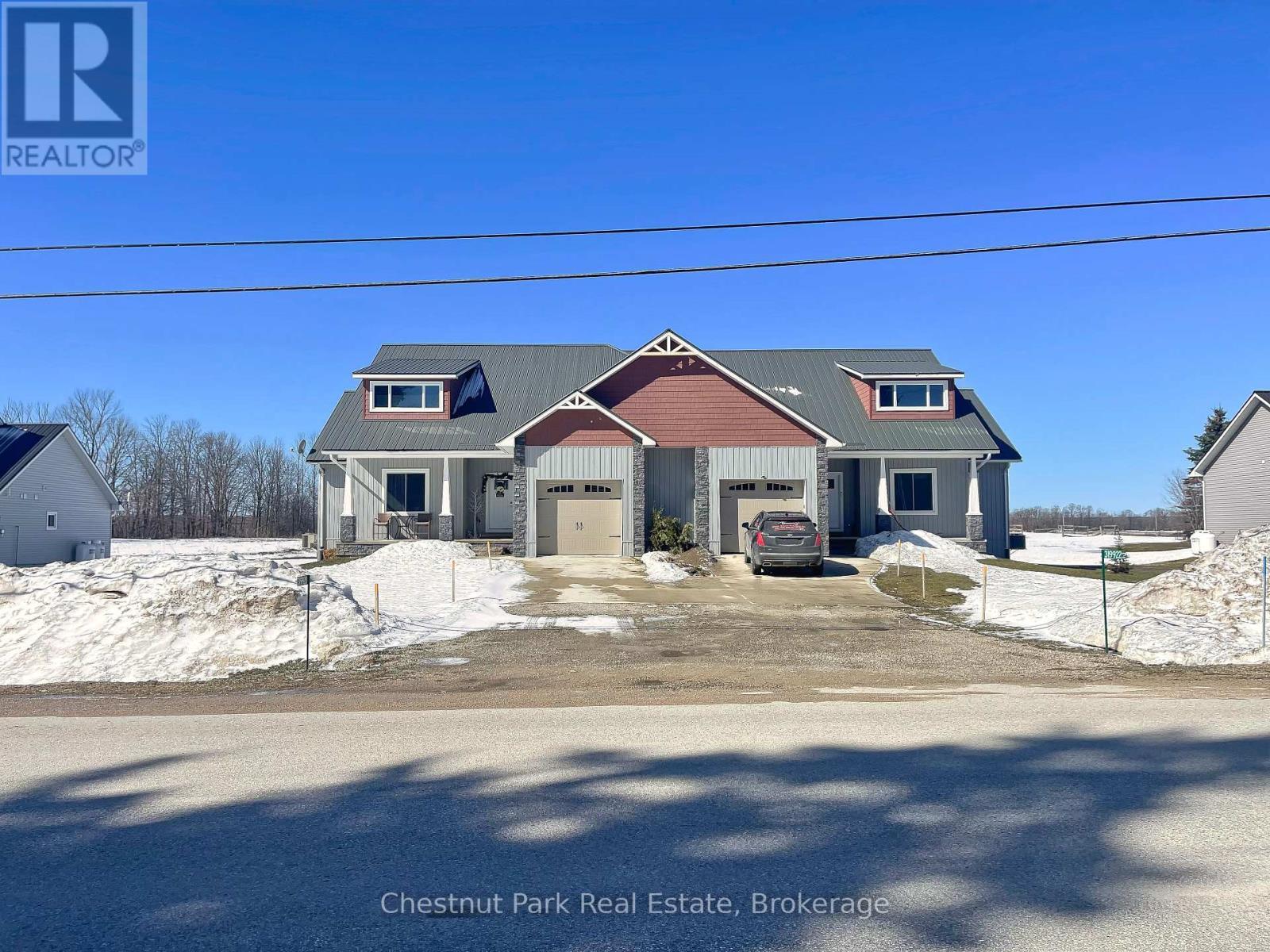 319916-319926 Kemble Rock Road, Georgian Bluffs, ON - Outdoor With Facade