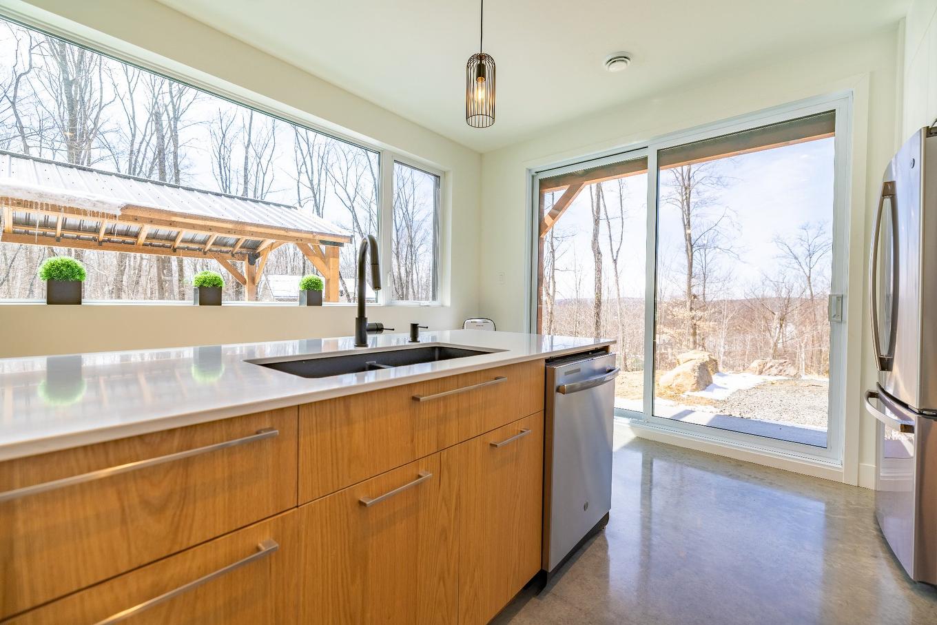 Aerial photo - 14 Ch. Des Colibris, Saint-Hippolyte, QC - Indoor Photo Showing Kitchen With Double Sink