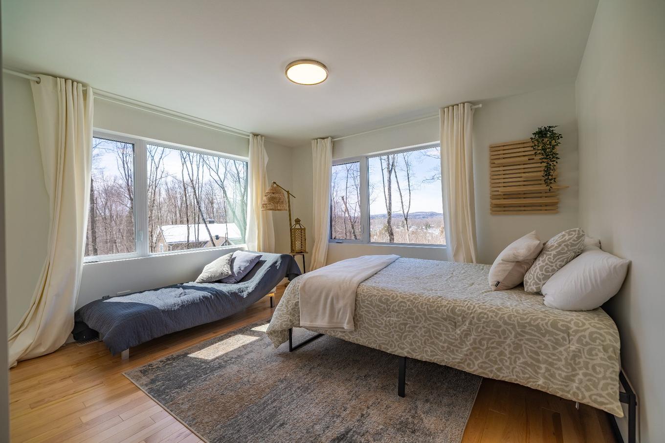 Aerial photo - 14 Ch. Des Colibris, Saint-Hippolyte, QC - Indoor Photo Showing Bedroom