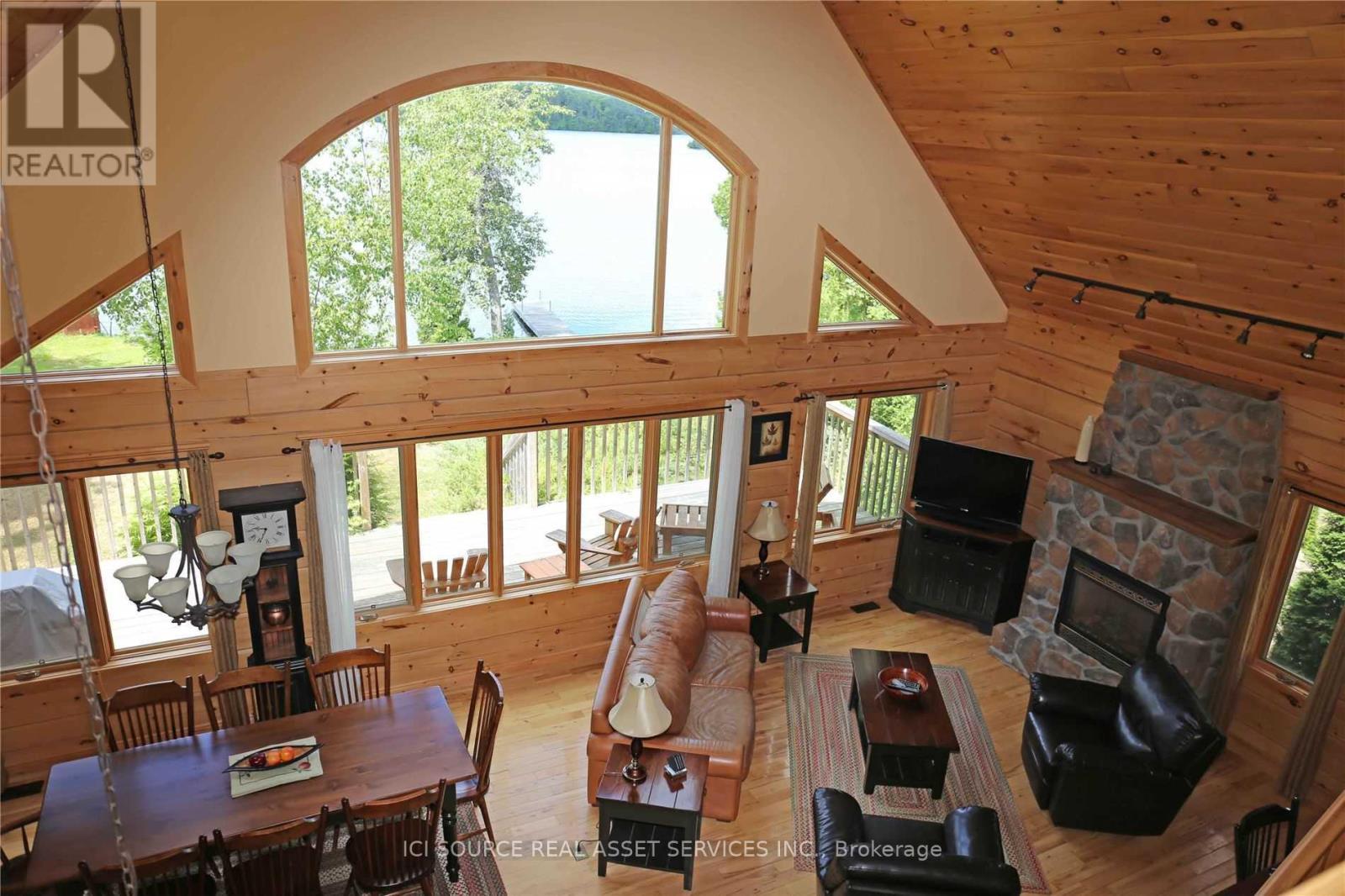 A - 1016 Twin Pine Lane, Frontenac, ON - Indoor Photo Showing Other Room With Fireplace