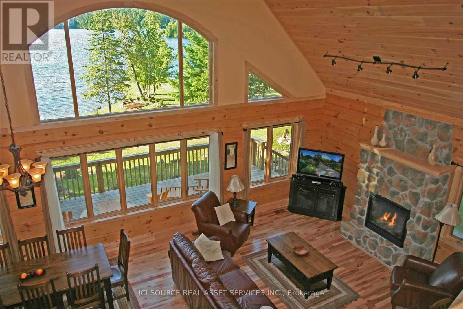 A - 1016 Twin Pine Lane, Frontenac, ON - Indoor With Fireplace