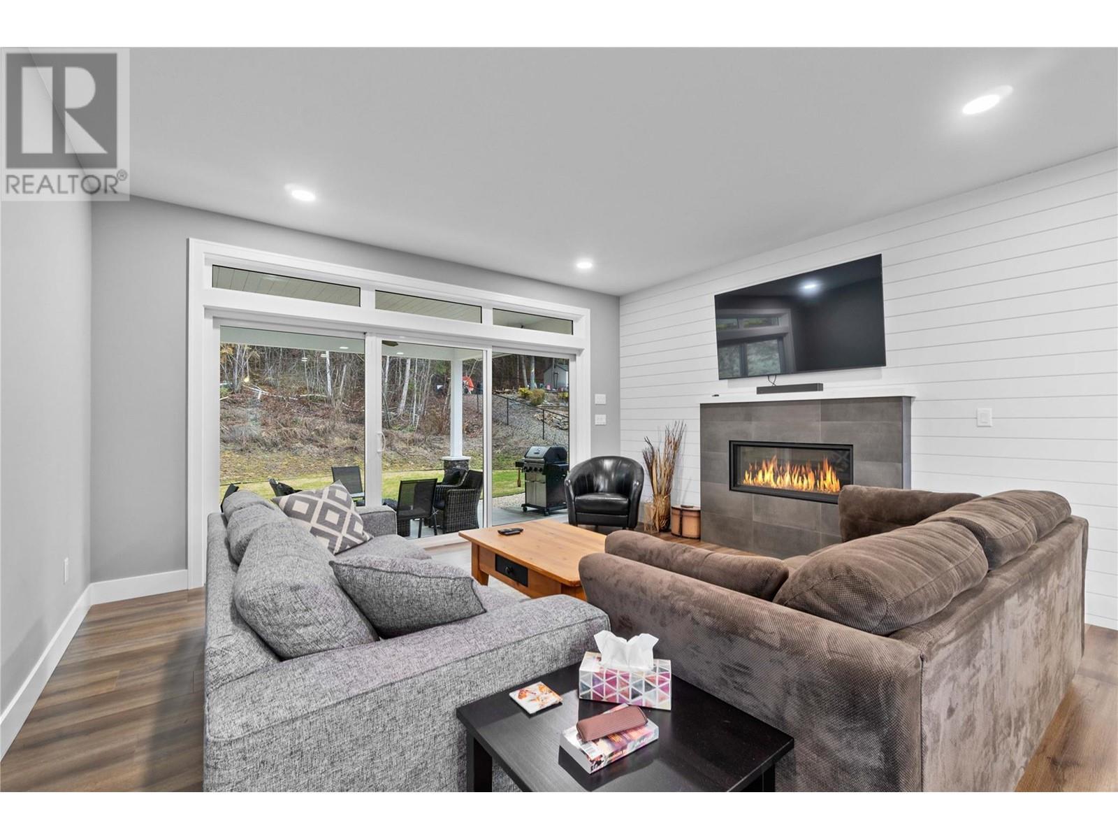 2763 Valleyview Drive, Blind Bay, BC - Indoor Photo Showing Living Room With Fireplace