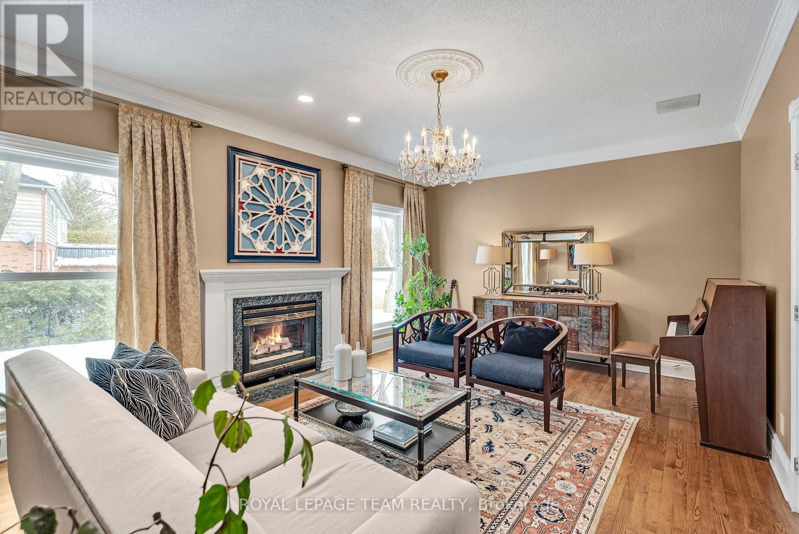 1345 Potter Drive, Ottawa, ON - Indoor Photo Showing Living Room With Fireplace