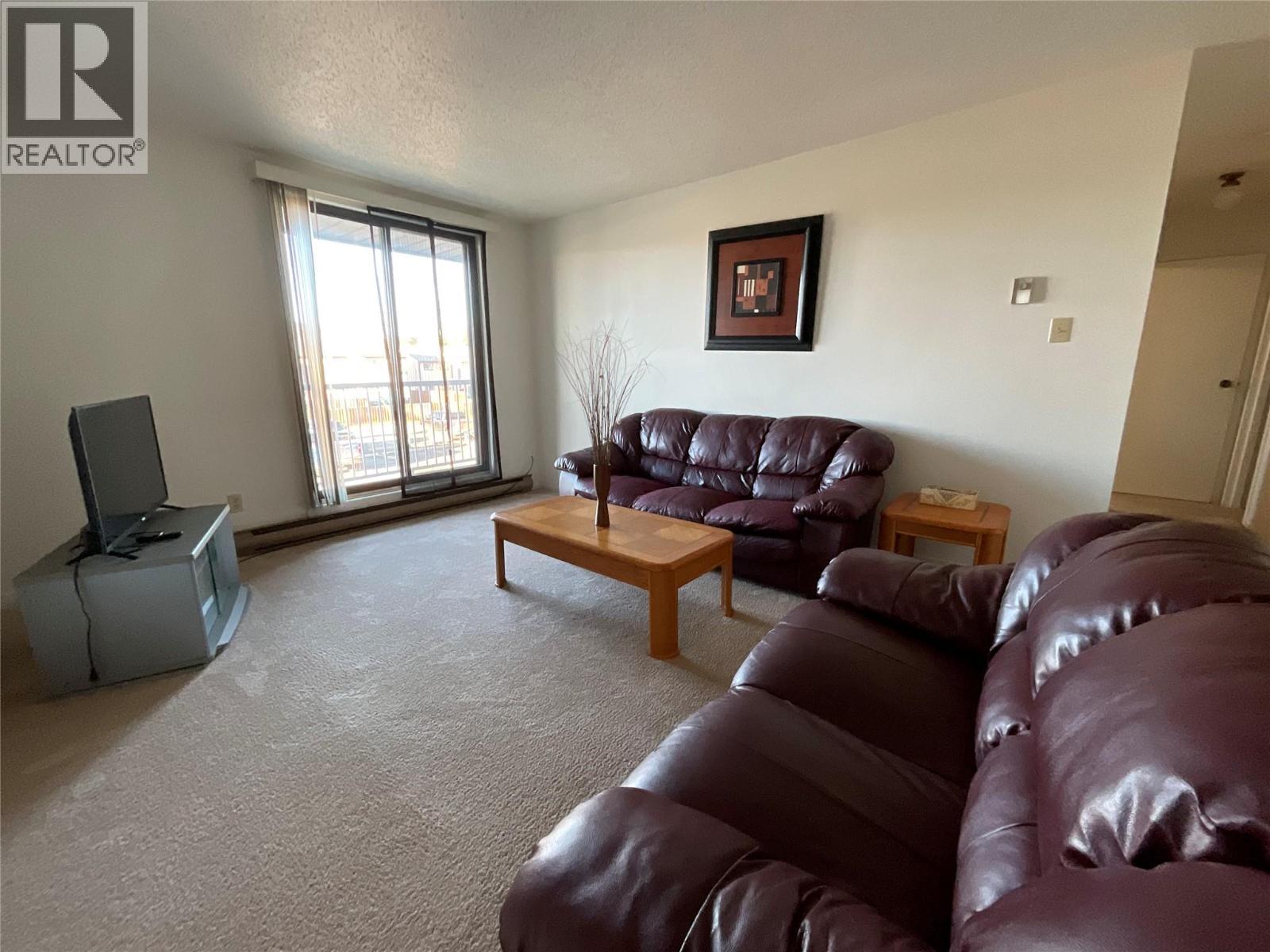 212 Spieker Avenue Unit# 202, Tumbler Ridge, BC - Indoor Photo Showing Living Room