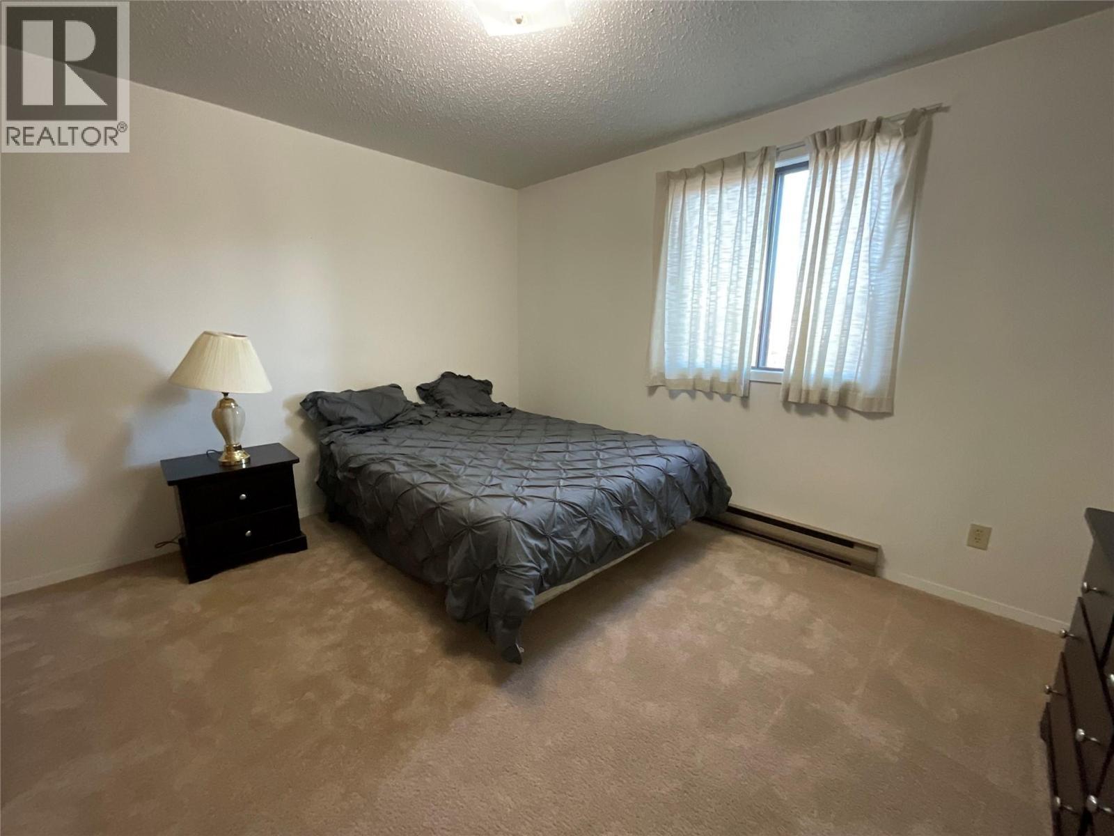 212 Spieker Avenue Unit# 202, Tumbler Ridge, BC - Indoor Photo Showing Bedroom