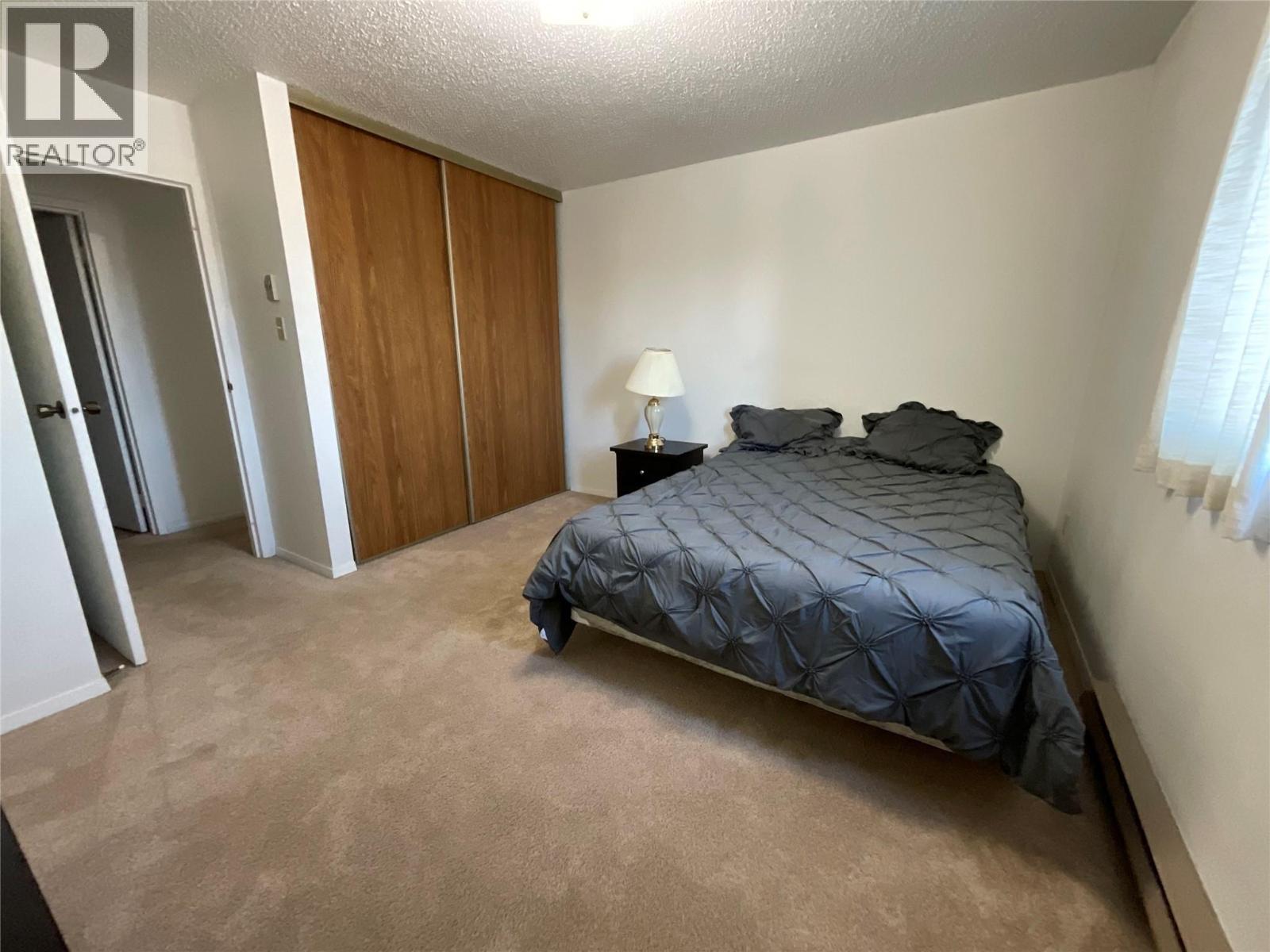 212 Spieker Avenue Unit# 202, Tumbler Ridge, BC - Indoor Photo Showing Bedroom