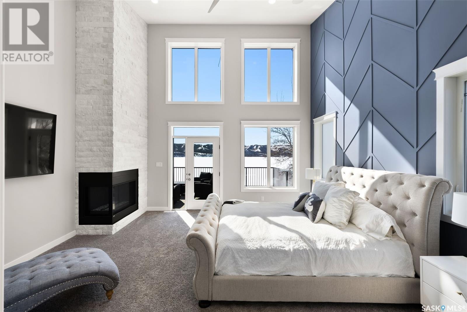 802 Groomes Vista Road, North Qu'Appelle Rm No. 187, SK - Indoor Photo Showing Bedroom With Fireplace