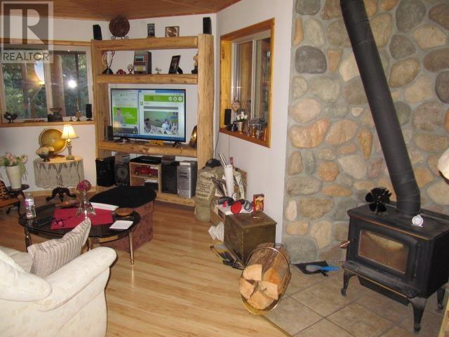 3561 Canim-Hendrix Lake Road, 100 Mile House, BC - Indoor With Fireplace