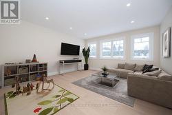 Family room off kitchen Digitally Staged -