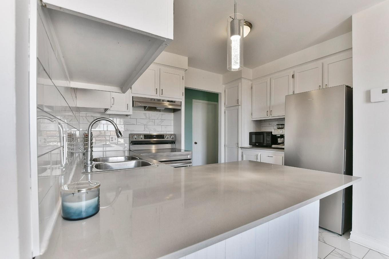Kitchen - 7-3005 Boul. De Mascouche, Mascouche, QC - Indoor Photo Showing Kitchen With Double Sink